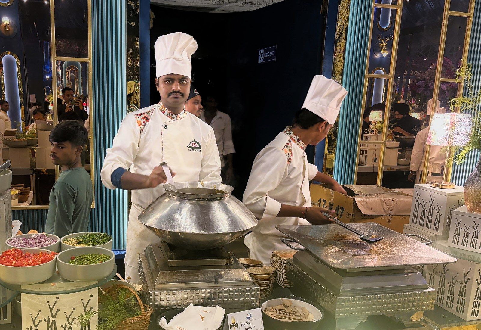 Chefs at the Delhi Special Matar Kulcha counter