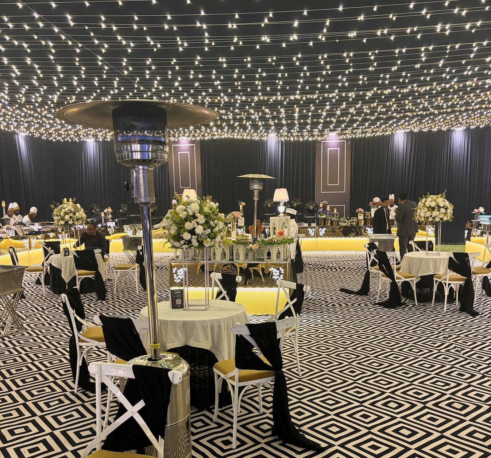 Dining hall under a ceiling of fairy lights